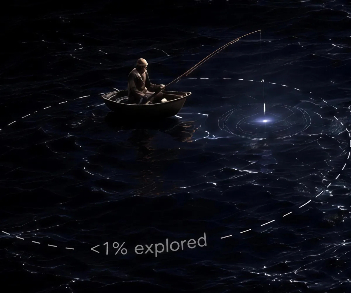 A lone angler probing one lit spot of the ocean — less than 1% explored